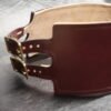Front three-quarter view of the Burgundy English Bridle leather Owned Riding Belt with solid brass buckle and hardware.