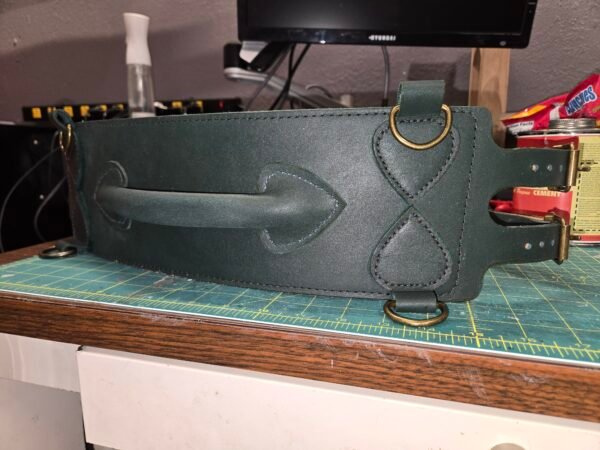 Dark green leather Owned Riding Belt “Treasure Belt” with antiqued brass hardware, raised rear control handle, and four D-ring attachment points.
