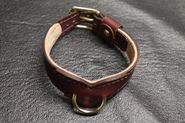 Drop Tip Sigil Collar Burgundy 2 Burgundy English Bridle leather Drop Tip Sigil Collar with solid brass hardware, shown from the inside to highlight the natural lambskin lining and shaped front profile.
