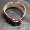 Collar Burgundy 3 Burgundy Drop Tip Sigil Collar shown from an angled view with solid brass hardware and shaped front.