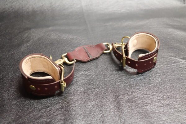 Cuff Set Connected 4 Black leather Owned Wrist Cuffs connected together with a matching leather tether.