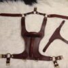 Harness v2.3 Burgundy - Flat 1 Burgundy English Bridle leather Owned Riding BDSM Harness laid flat with solid brass hardware, dual back handles, adjustable chest and torso straps, and detachable Y-shaped front strap.