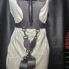 Harness v2.3 - on Mannequin Black - w-Cuffs Black leather Owned Riding BDSM Harness with red stitching, horizontal and vertical handles, two D-ring attachment points, custom embossing, attached tethers, and Owned Riding Cuffs.